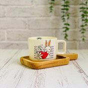 تصویر ماگ سرامیکی عروسکی طرح خرگوش و گل بابونه 