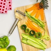 تصویر پوست کن کمانی دو تیغه استیل برند شنگیا 