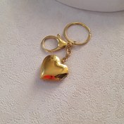 تصویر لاکت استیل قلبی طلایی - حکاکی نوشته یا طرحای مینیمال / جاکلیدی 