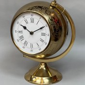 تصویر ساعت رومیزی طرح کره زمین طلایی 