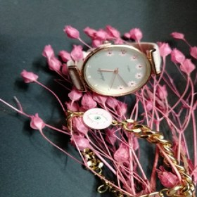 تصویر ست ساعت و دستبند صورتی 