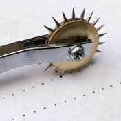 تصویر رولت خیاطی دندانه‌دار (تیز) 