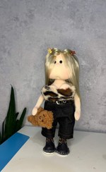 تصویر عروسک دختر«طرح پلنگ» 