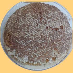 تصویر عسل مومدار ۱۰۰۰ گرم 