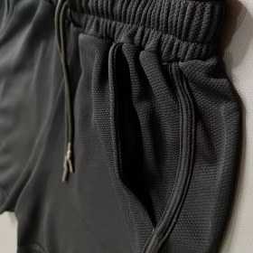 تصویر شلوارک ورزشی نایکی مدل NIKE02 با جیب دار 