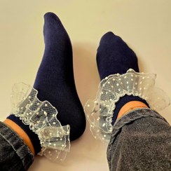 تصویر جوراب توری سرمه ای با خالخالی سفید 