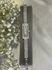 تصویر ساعت مچی عقربه‌ای و دیجیتالی 