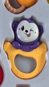 تصویر جغجغه دستی میمون 