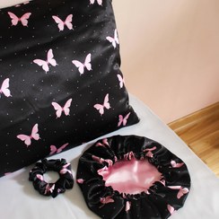 تصویر ست ساتن ابریشم طرح پروانه زمینه مشکی 