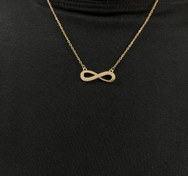 تصویر گردنبند زنانه طرح بی‌نهایت طلایی با نگین‌های درخشان 