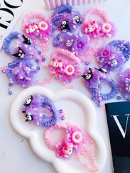 تصویر کش مو چروکی آویزدار طرح کرومی و ملودی 