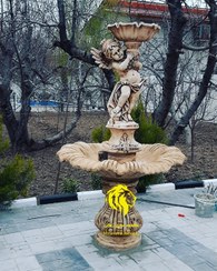 تصویر آبنما برگی یک طبقه با مجسمه بامبو 