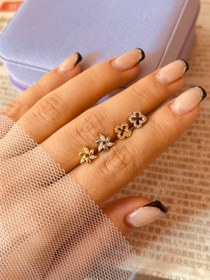 تصویر پیرسینگ گوش ونکلیف گل 