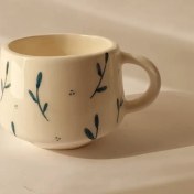 تصویر فنجان طرح برگ آبی 