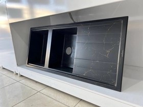 تصویر سینک ظرفشویی گرانیتی توکار دو لگن مشکی با رگه طلایی برند لوتوس 