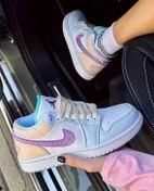 تصویر کتانی زنانه نایکی مدل Jordan 1 Low رنگ صورتی با جنس چرم 