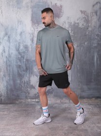 تصویر ست تیشرت و شلوارک ورزشی نایک - سبز زیتون / XL 
