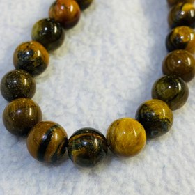 تصویر ریسه چشم گربه قهوه‌اى 