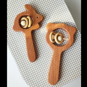 تصویر جغجغه دسته دار چوب راش 