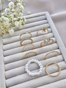 تصویر پک انگشتر ۹ تایی طلایی 