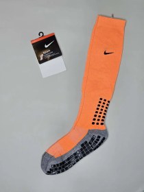 تصویر جوراب استپدار فوتبالی بلند کیفیت مستر خارجی رنگ نارنجی 