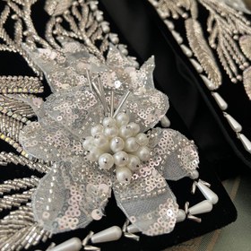 تصویر جلیقه گل برجسته سفید 