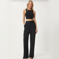 تصویر شلوار زنانه پارچه‌ای مشکی ترک با کمر چسبی کشی 