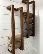 تصویر استند چوبی جا حوله‌ای دیواری حمام 