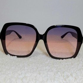 تصویر عینک صفحه شامپاینی دور مشکی 