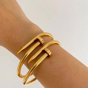 تصویر دستبند استیل میخی طلایی 
