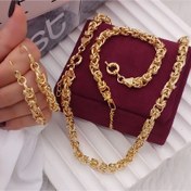 تصویر سرویس جواهرات طرح طلا شامل گردنبند، گوشواره و دستبند 