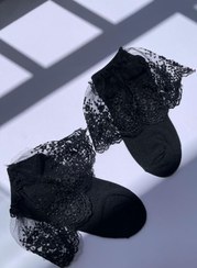 تصویر جوراب زنانه مشکی تور‌دار مجلسی 