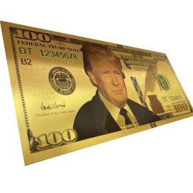 تصویر اسکناس 100 دلار آمریکا طرح دونالد ترامپ روکش آب طلا 