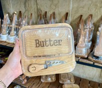 تصویر کره و پنیر خوری چوبی با کارد لبخند 