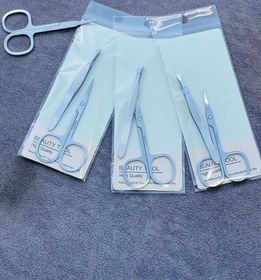 تصویر ست موچین و قیچی 