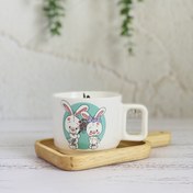تصویر ماگ سرامیکی عروسکی طرح خرگوش خجالتی سبز 