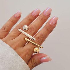 تصویر انگشتر زنانه طرح خط و نقطه طلایی و نقره نانو رنگ ثابت Women's ring with line and dot design, gold and silver nano color fixed