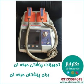 تصویر دستگاه الکتروشوک نیهون کهدن Nihon Kohden بایفازیک همراه با AED 