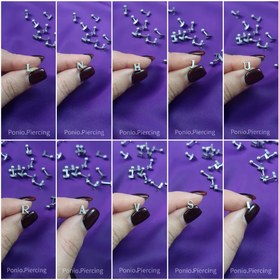 تصویر پیرسینگ حروف انگلیسی 