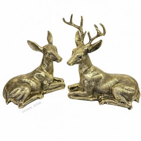 تصویر مجسمه برنزی گوزن و آهو نشته 