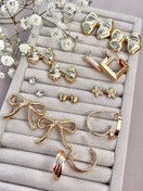 تصویر پک گوشواره ۹ جفتی طلایی 