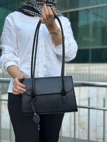 تصویر کیف سر شانه ای زنانه تهیه شده از چرم طبیعی گاو مدل ویشا Women's shoulder bag made of natural cow leather, model Visha