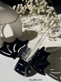 تصویر کلیپس مو مشکی مدل پروانه‌ای 