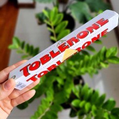 تصویر شکلات شیری تابلرون Toblerone با طعم عسل و بادام 100 گرم شکلات و فرآورده های کاکائویی تابلرون