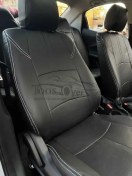 تصویر روکش صندلی فردا موتور FMC 511 چرم مشکی دوخت سفید 