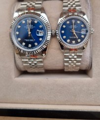 تصویر ست ساعت زنانه و مردانه رولکس دیت جاست درجه یک نقره ای رنگ صفحه آبی ROLEX DATEJUST OYSTER PERPETUAL