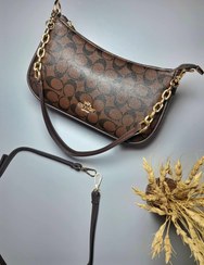 تصویر کیف دستی و دوشی دخترانه کوچ مدل آگرین با چرم مصنوعی 