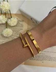 تصویر دستبند میخی استیل 