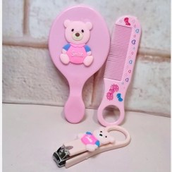 تصویر ست آینه، شانه و ناخن گیر طرح Smile 