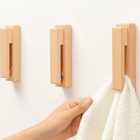 تصویر آویز لباس چوبی تیله ای 